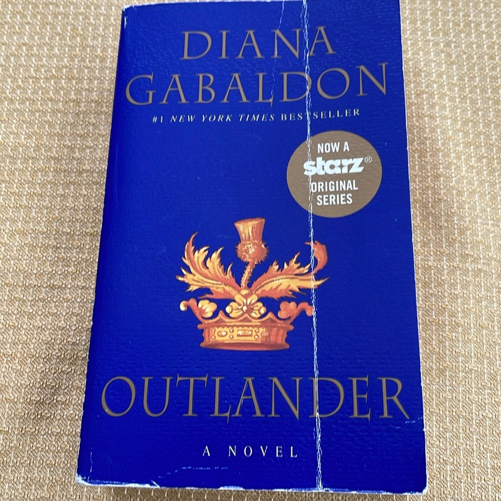 Outlander series book by Diana Gabaldon. 3 for 12.